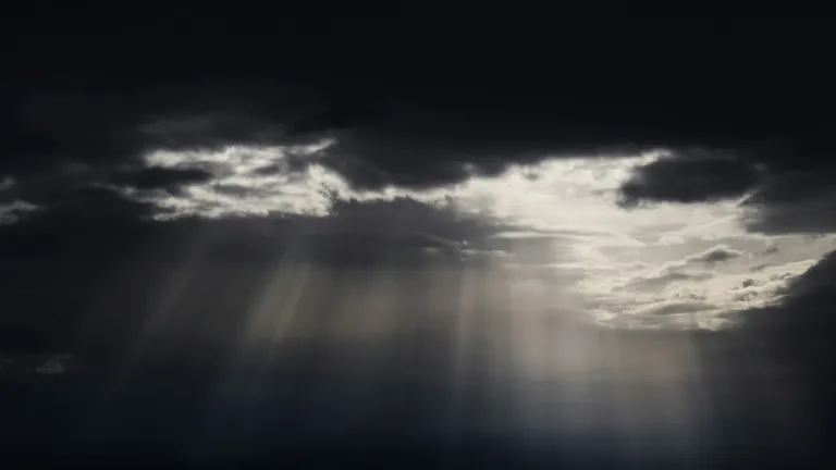 Light streaming through dark clouds