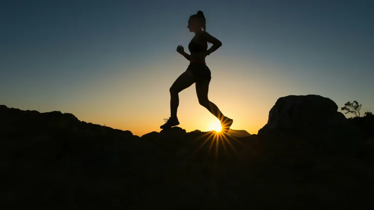 you’ve been taught that we always need to breathe because our bodies can’t store oxygen. I believe that the reason God made us this way is so that we are reminded to rely on Him every day. a silhouette of a running woman against a sunset