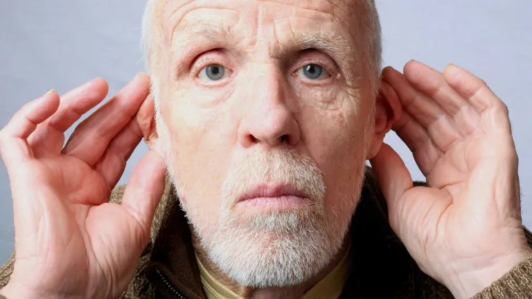 Cupping your hands behind your ears illustrates how the outer ear is perfectly shaped to capture and amplify sound, reflecting the intelligent design of our hearing. An older man cups his ear, illustrating the God-designed shape of the outer ear that amplifies sound—reminding us that even hearing reflects intelligent design.