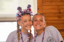 Two campers smiling