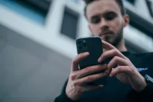 a man looking at his phone