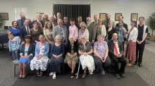A group of people posing for a photo