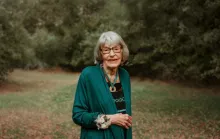 a woman standing outdoors