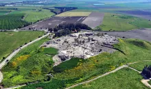 The ruins of Tel Megiddo today with the Valley of Jezreel behind.
