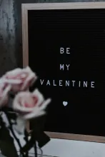 A sign that says. "Be My Valentine".
