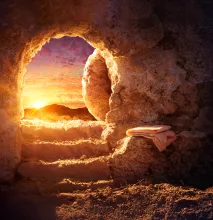 A photo illustration of an open tomb.
