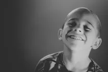 a boy smiling