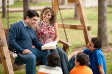 A family reading the Bible together.