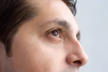A close up of a man's face.