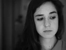 A closeup of young woman's face.