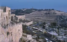 The prophet Zechariah describes how Jesus will return to the Mount of Olives (background, above), which overlooks Jerusalem (foreground) on the city’s east side.