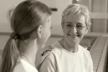 Two women talking.