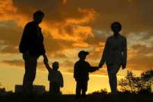 A silhouette of a family.