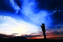 A person praying.