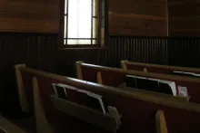 Pews inside a church.