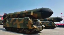 The North Korean military parades its KN-15 missile, thought to be nuclear-capable, in 2017.