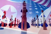 Photo illustration of missiles, the North Korean flag and the United States flag.