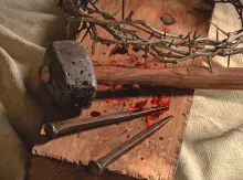 Old hammer, nails and thorns.