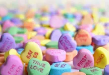 A pile of Valentine candy hearts.