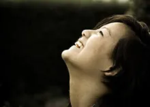 A woman looking up into the sky.