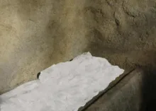 Inside of a tomb showing a white cloth