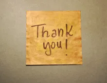 Thank you! written on brown paper.
