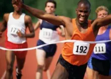 Runner crossing finish line - The Hope of Glory