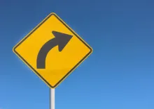 street sign with turn arrow