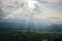Sun rays coming through the clouds.