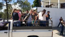 Volunteers in a truck bed