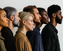 A group of people of different races and sexes.