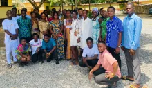 a group of young adults wearing dressy clothing