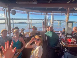 people riding a boat