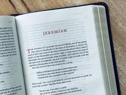 A Bible opened to the book of Jeremiah.