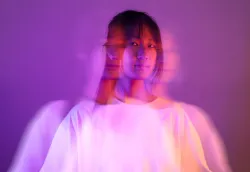 A photo illustration of a woman blurred.