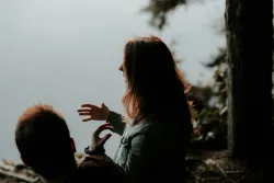 Friends talking outside.