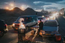 Cars going through a checkpoint from Ramallah, Palestine to enter Israel.