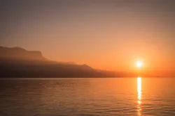 A sunset over a body of water.