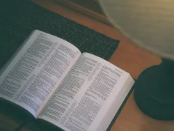 An open Bible to Psalm 119.