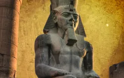 Colossus of Ramses II (made in black granite) in the Luxor Temple (Egypt)
