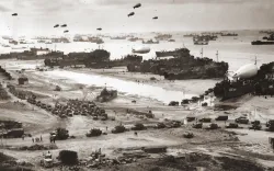 With the Normandy beachhead secured, vast numbers of Allied troops and military vehicles flood ashore.