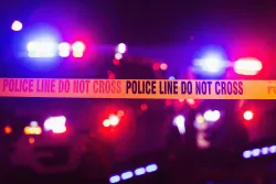 Police tape at a crime scene.