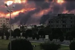 A Saudi oil facility burns after an Iranian attack.