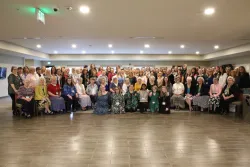 a group of ladies gathered for the enrichment weekend