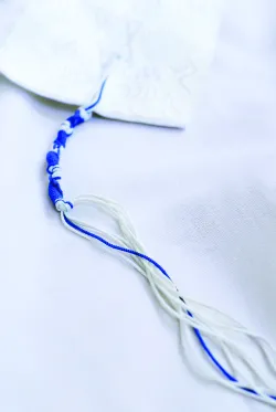Tassels are a popular Jewish tradition. Tassels are small, knotted cords of strings, usually about six to 10 inches in length, worn about waist high.