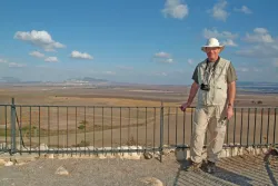 Darris McNeely stands atop the hill of Megiddo.