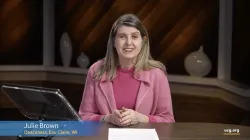a woman seated at a desk