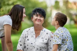 A mom with her daughter and son.