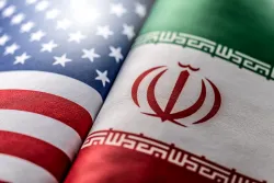 United States and Iranian flags.