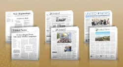 several newspapers displayed on a gold background